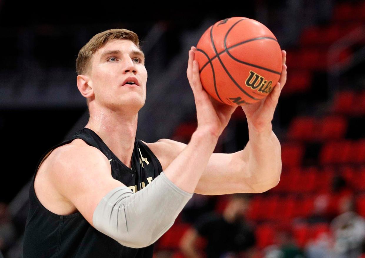 Mar 15, 2018; Detroit, MI, USA; Purdue Boilermakers center Isaac Haas (44) takes a shot during the practice day before the first round of the 2018 NCAA Tournament at Little Caesars Arena. Mandatory Credit: Raj Mehta-USA TODAY Sports