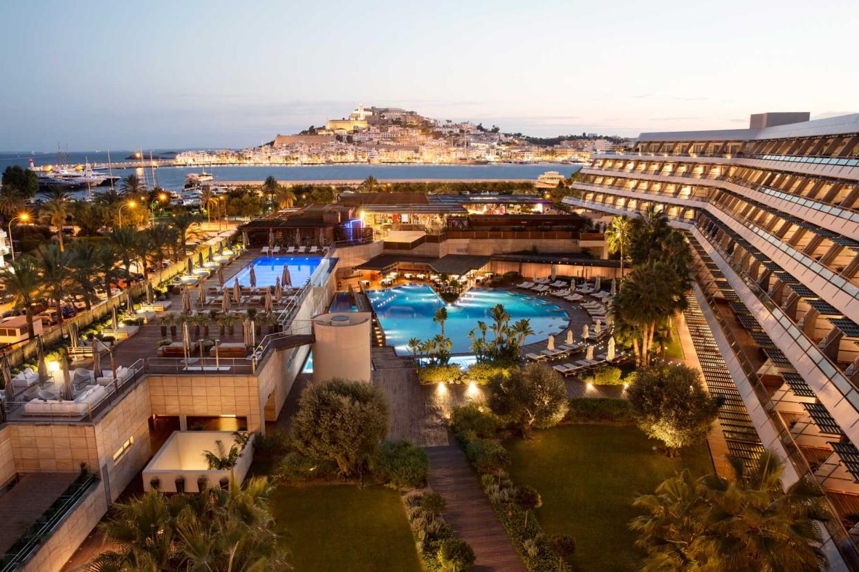 Ibiza Gran Hotel seen from an elevated view at night time