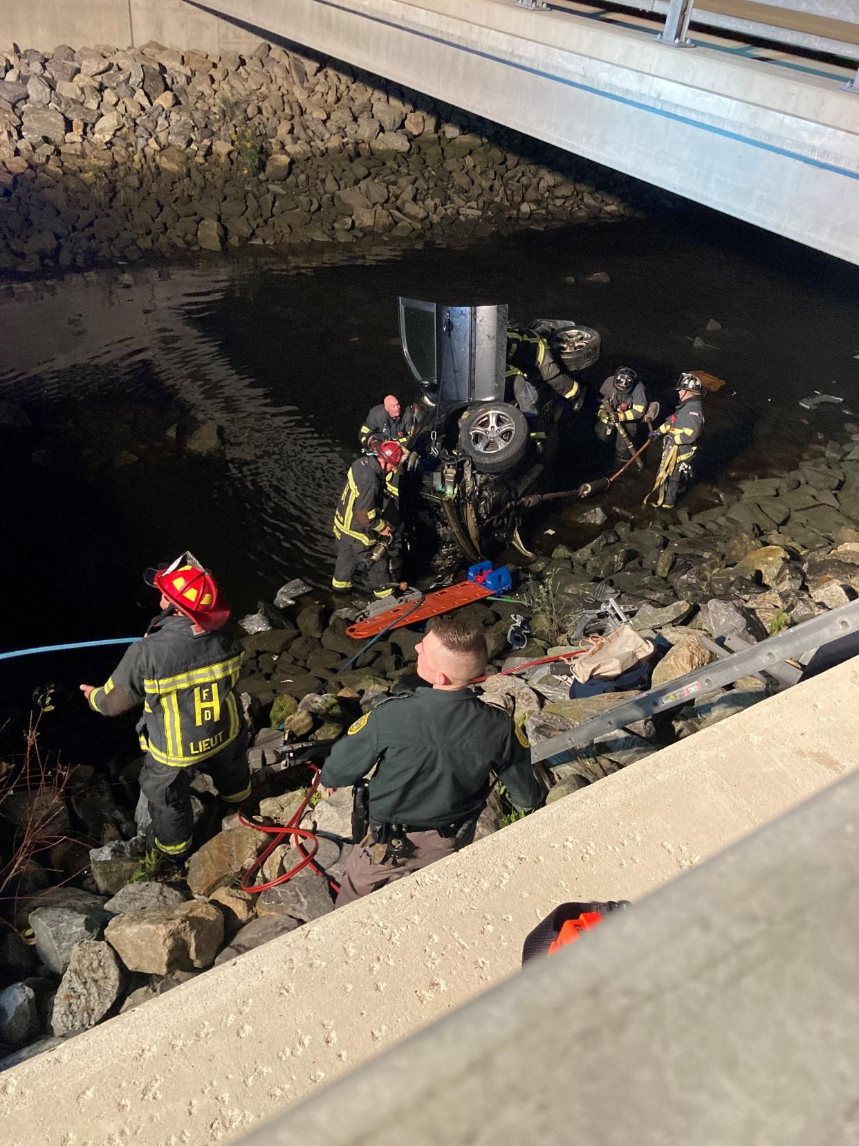 At approximately 12:54 a.m., troopers from the New Hampshire State Police Troop A responded to a report of a crash on Interstate 95 involving a single car that had struck the Taylor River Bridge and landed in the water below.