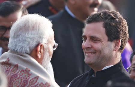 Prime Minister Narendra Modi (L) talks to Rahul Gandhi, president of India's main opposition Congress party, during the "At Home" reception at the Rashtrapati Bhavan presidential palace after the Republic Day parade in New Delhi, India, January 26, 2018. REUTERS/Adnan Abidi