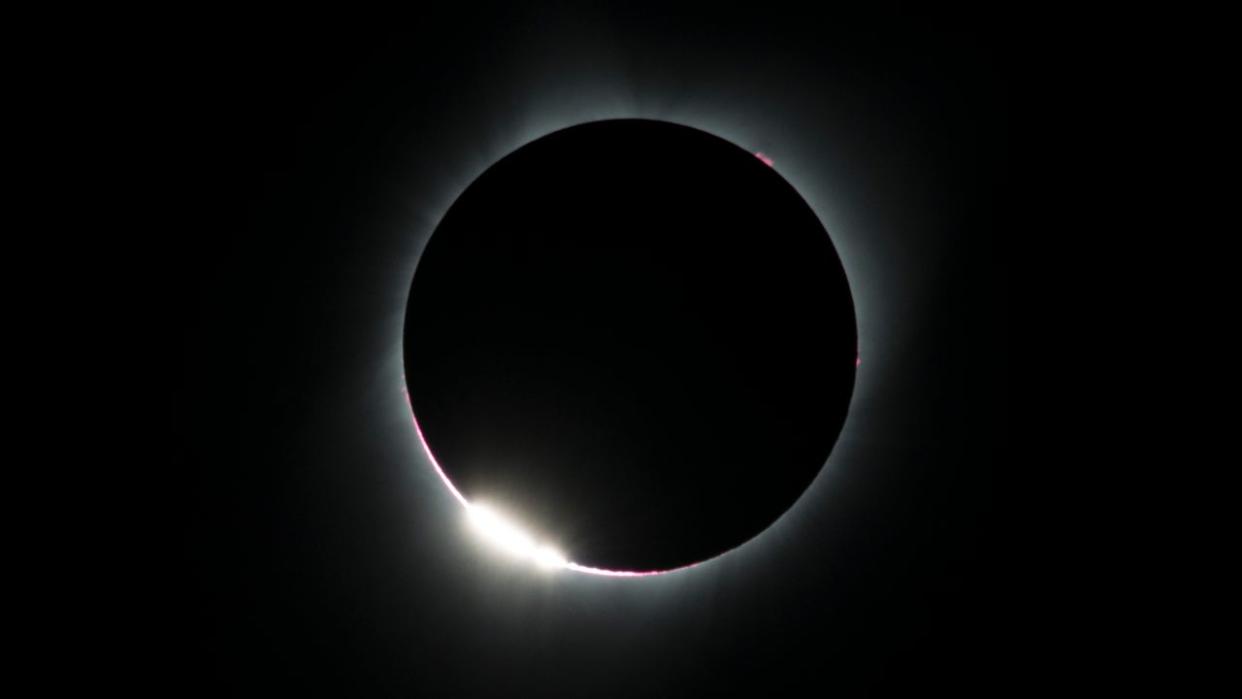 <div>TOPSHOT - The "diamond ring effect" is seen during a total solar eclipse as seen from the Lowell Observatory Solar Eclipse Experience on August 21, 2017 in Madras, Oregon. Millions will be able to witness the total eclipse that will touch land in Oregon on the west coast and continue through South Carolina on the east coast. (Photo by STAN HONDA / AFP) (Photo by STAN HONDA/AFP via Getty Images)</div>