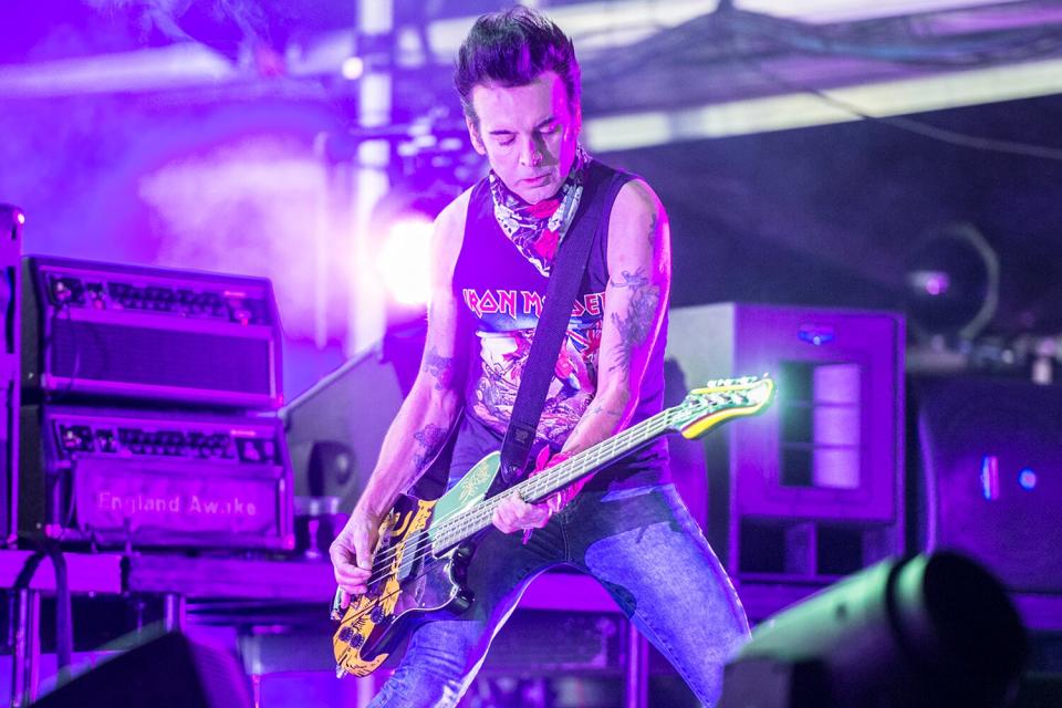 Simon Gallup of The Cure performs onstage headlining day 3 of Bestival 2016 at Robin Hill Country Park on September 10, 2016 in Newport, Isle of Wight.