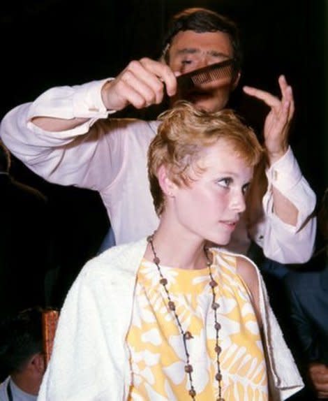 VIdal Sassoon cutting Mia Farrow's hair on the set of Rosemary's Baby