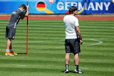 Football Soccer - Euro 2016 - Germany Training - Stade Camille Fournier, Evian-Les-Bains, France - 27/6/16 - Germany's Mario Goetze and coach Joachim Loew during training. REUTERS/Denis Balibouse