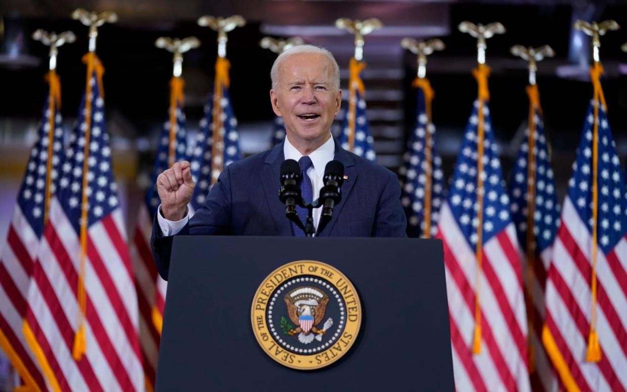 President Joe Biden delivers a speech on infrastructure spending at Carpenters Pittsburgh Training Center - AP