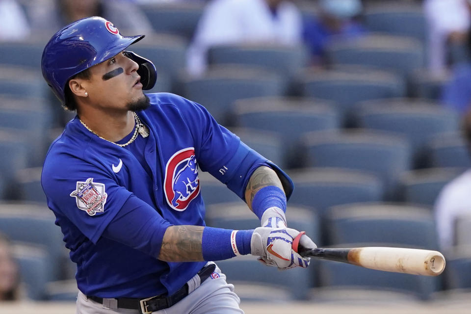 Chicago Cubs Javier Baez watches his first-inning, two-run home run off New York Mets starting pitcher Marcus Stroman in a baseball game Thursday, June 17, 2021, in New York. The two runs held up as the Cubs won 2-0. (AP Photo/Kathy Willens)