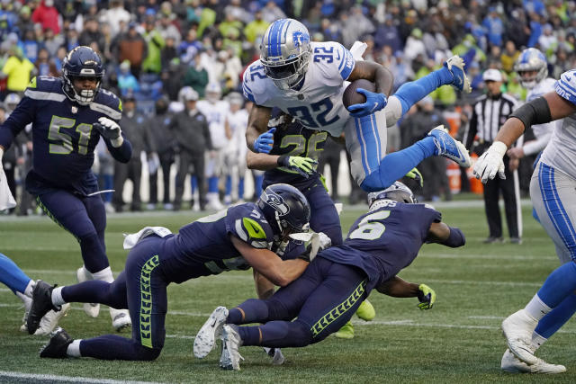 Penny, Metcalf lead Seahawks to 51-29 blowout of Lions