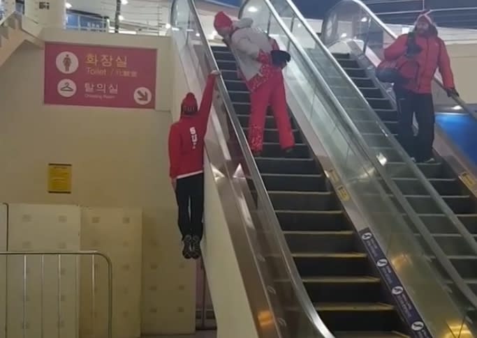 Fabian Bösch rides the escalator rail at the Olympics. (Instagram/@buhsch)