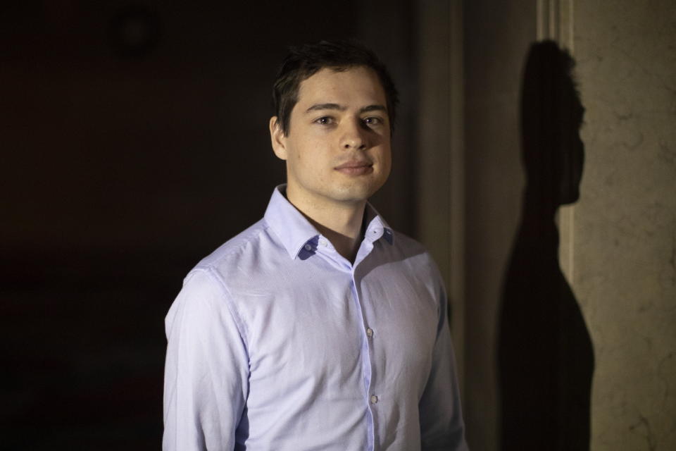 Alexander Vavilov, the Toronto-born son of Russian spies, whose Canadian citizenship has now been affirmed by the Supreme Court of Canada, poses for a portrait after speaking to media in Toronto, Friday, Dec. 20, 2019. (Chris Young/The Canadian Press via AP)