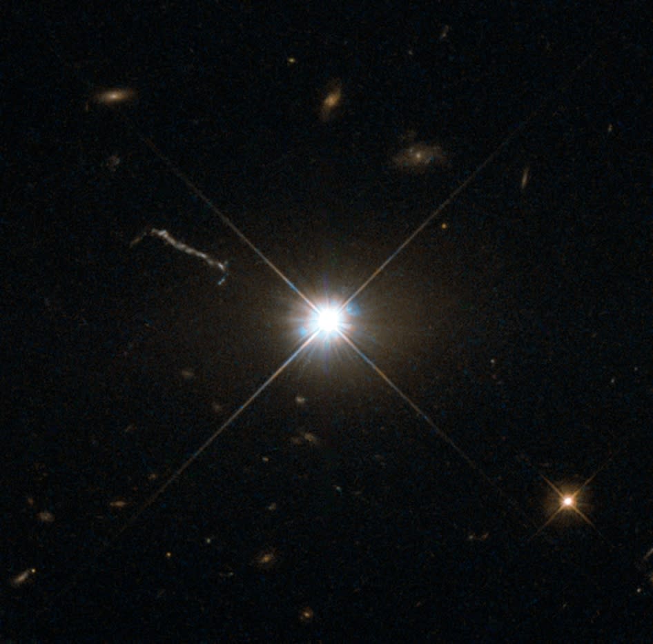 The Hubble Space Telescope captured this image of the ancient and spectacular quasar 3C 273, which resides in a giant elliptical galaxy in the constellation Virgo.  It took us about 2.5 billion years to reach its light.  Despite this great distance, it is still one of the closest quasars to our home.  It was the first quasar ever identified, and was discovered in the early 1960s by astronomer Allan Sandage.