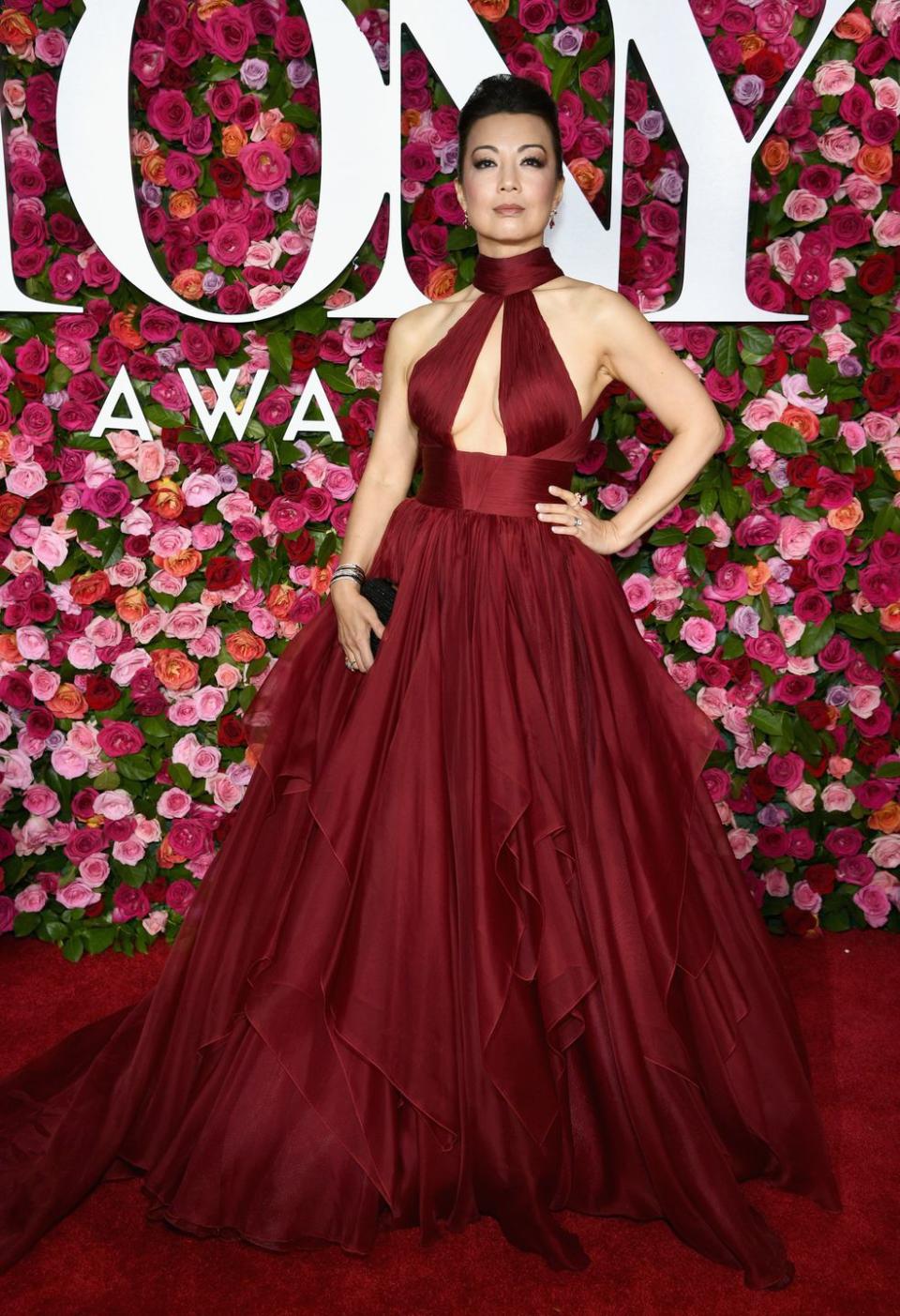 <p>In Mar Zunino and a Tadashi Shoji clutch. </p>