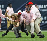 <p>Security guards bring down a fan who ran onto the field as the Chicago Bears take on the Carolina Panthers at Soldier Field on October 22, 2017 in Chicago, Illinois. The Bears defeated the Panthers 17-3. (Photo by Jonathan Daniel/Getty Images) </p>