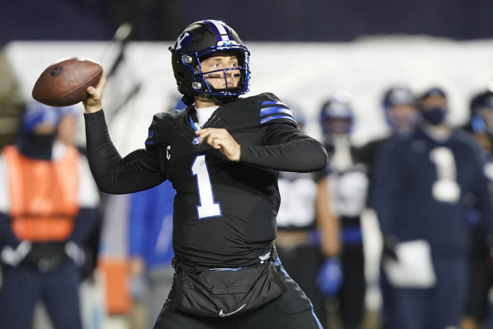 BYU quarterback Zach Wilson looks for a receiver during the first half of the team's NCAA college football game against San Diego State on Saturday, Dec. 12, 2020, in Provo, Utah. (AP Photo/George Frey, Pool)