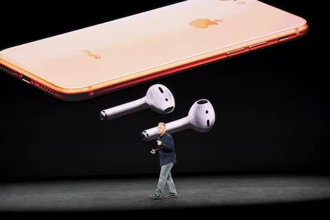 Apple hasn't brought the headphone jack back, but will work with the company's AirPods - Credit: Bloomberg 