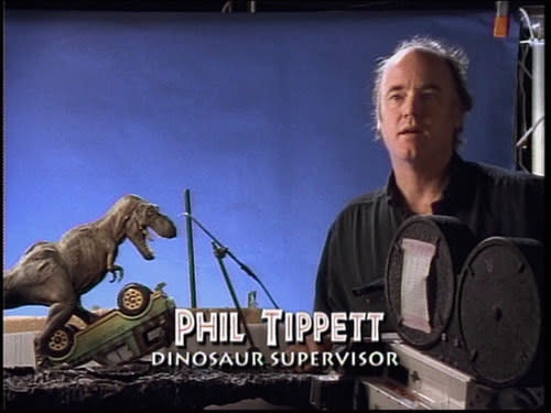 Phil Tippett, "dinosaur supervisor," with a model