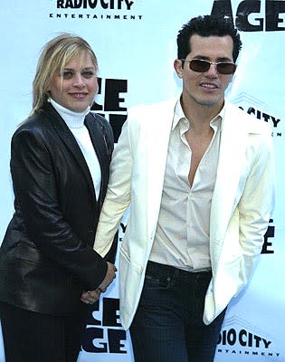 John Leguizamo and wife Justine at the Radio City Music Hall premiere of Ice Age