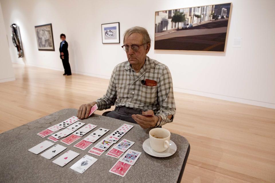In a photo made Friday, June 28, 2013, Duane Hanson's "Old Man Playing Solitaire," part of the Lunder Collection, is on display at the Colby College Museum of Art in Waterville, Maine. An exhibition of 280 works in the Lunder Collection opens on July 13. (AP Photo/Robert F. Bukaty)