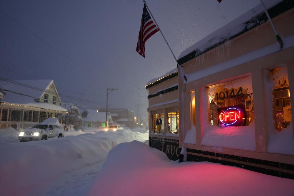 A restaurant remains open during a powerful multiple day winter storm in the Sierra Nevada mountains on March 02, 2024 in Truckee, California.
