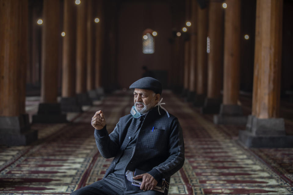 Altaf Ahmed Bhat, one of the mosque officials talks to the Associated Press inside the Jamia Masjid, or the grand mosque in Srinagar, Indian controlled Kashmir, Nov. 13, 2021. Indian authorities see it as a trouble spot, a nerve center for anti-India protests and clashes that challenge New Delhi’s sovereignty over disputed Kashmir. For Kashmiri Muslims it is a symbol of faith, a sacred place where they offer not just mandatory Friday prayers but also raise their voice for political rights. In this fierce contestation, the grand mosque, has largely remained closed for the last two years. (AP Photo/Mukhtar Khan)