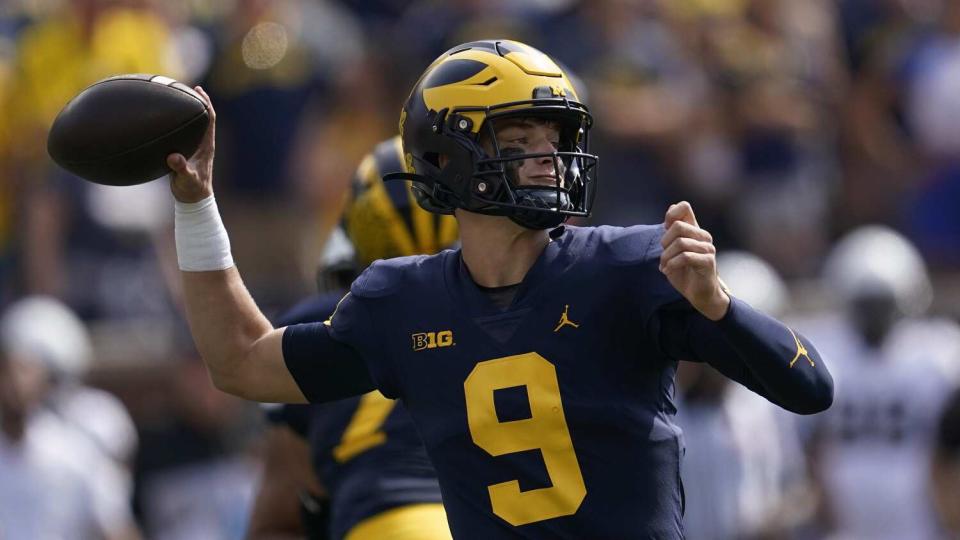 J.J. McCarthy throws for Michigan.