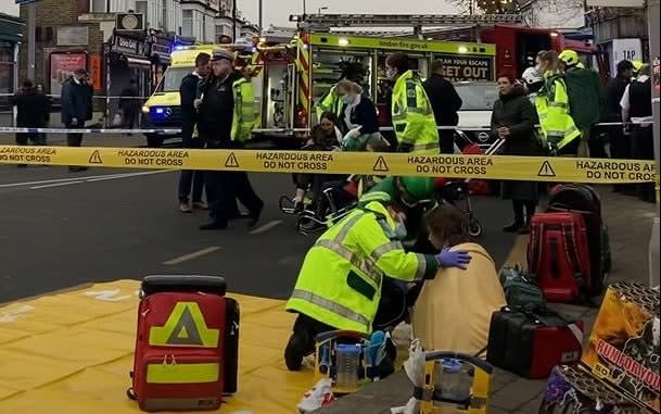 A person receiving treatment after the crash - @WalkingLondon_