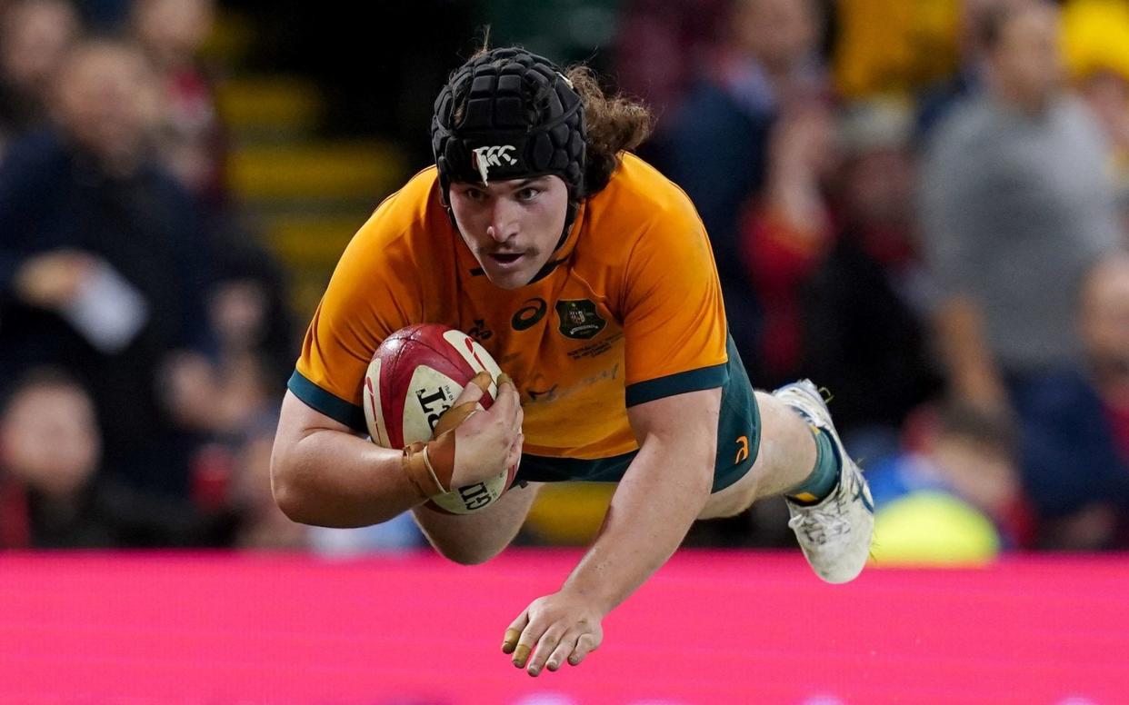 Lachlan Lonergan scores the winning try for Australia as the tourists rounded off a remarkable comeback against a shellshocked Wales - David Davies /PA