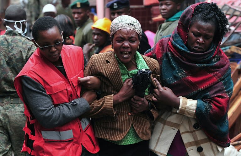 A woman mourns the loss of a relative after a building collapse in Kenya's capital Nairobi on April 30, 2016