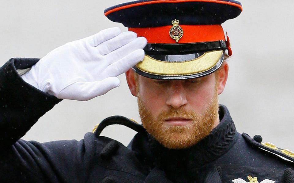 Prince Harry said he felt "trapped" by the institution - AFP