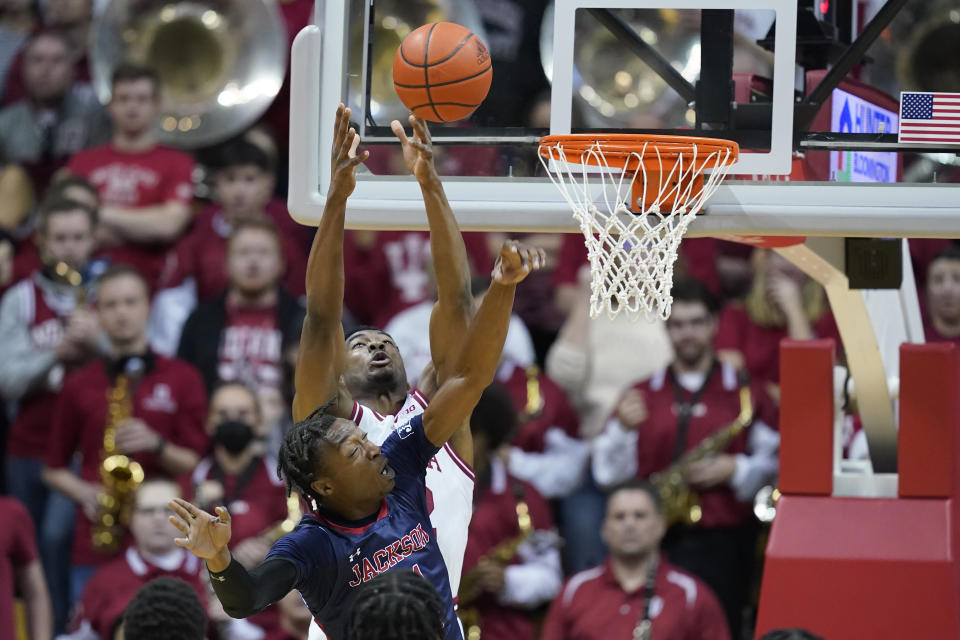 Indiana forward Jordan Geronimo (22) tries to catch a pass against Jackson State forward Jamarcus Jones (31) during the first half of an NCAA college basketball game, Friday, Nov. 25, 2022, in Bloomington, Ind. (AP Photo/Darron Cummings)