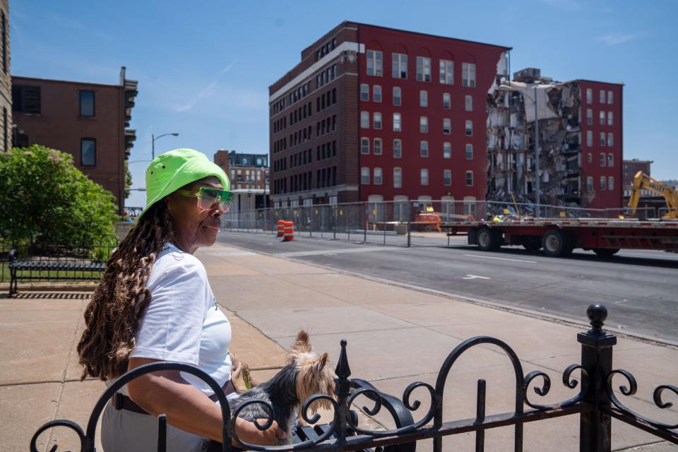 Penelope Scott waits to hear news of her first cousin Branden Colvin outside of his partially collapsed apartment building in Davenport Monday, May 29, 2023.