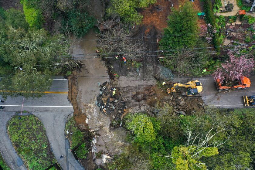 A road washed away on North Main Street of Santa Cruz during atmospheric river in California