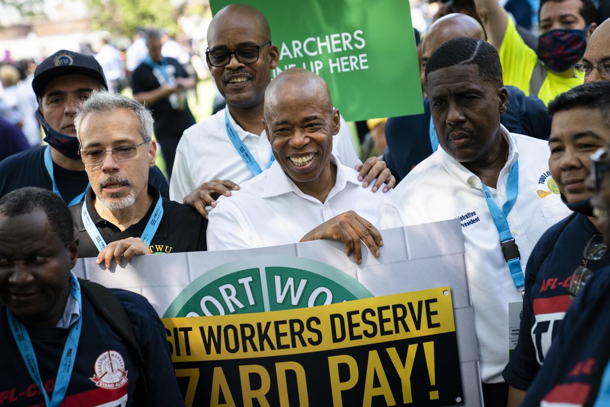 Brooklyn Borough President and a Democratic mayoral candidate Eric Adams smiles as participants gather for a march through the financial district during a parade honoring essential workers for their efforts in getting New York City through the COVID-19 pandemic, Wednesday, July 7, in New York. 