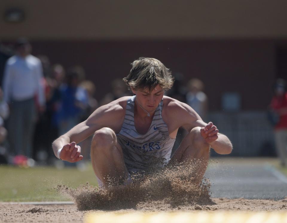 Frenship’s Cooper Scott competes in triple jump at the Lubbock ISD Invitational, Thursday, March 28, 2024, at Lowrey Field.