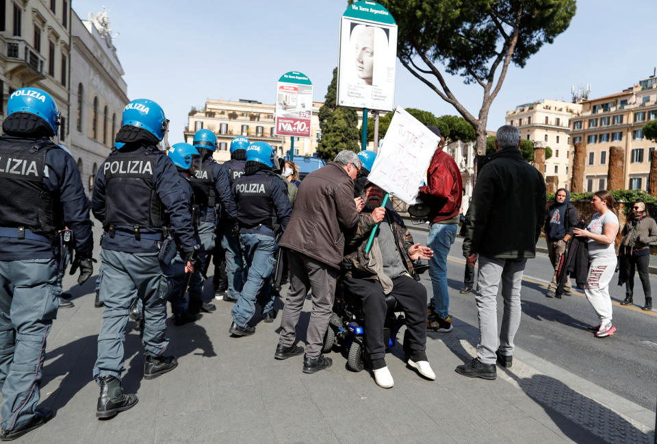 Police stormed a demonstration near the Ministry of Justice building in Rome as people protested the suspension of family visits to prisons due to coronavirus last week. (Photo: Yara Nardi / Reuters)