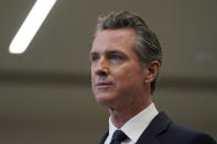 FILE — In the July 26, 2021 file photo Gov. Gavin Newsom speaks at a news conference in Oakland, Calif. Four of the high-profile Republican candidates, who are seeking to replace Newsom in next months recall election, are heading into their first televised debate, to be held Wednesday, Aug. 4, 2021. (AP Photo/Jeff Chiu, File)