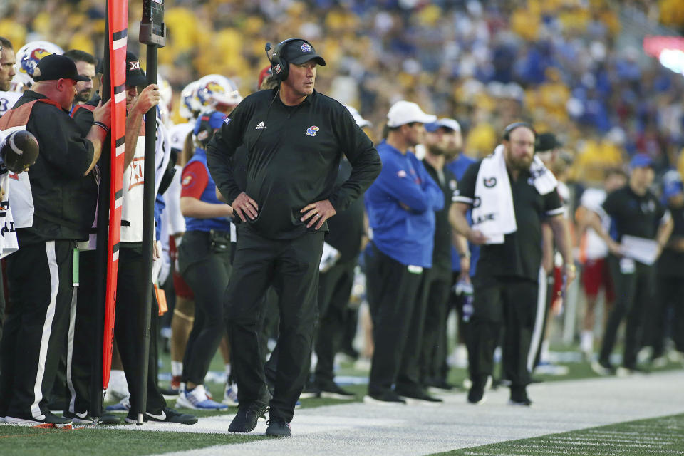 Kansas coach Lance Leipold watches from the sideline during the first half of an NCAA college football game against West Virginia in Morgantown, W.Va., Saturday, Sept. 10, 2022. (AP Photo/Kathleen Batten)