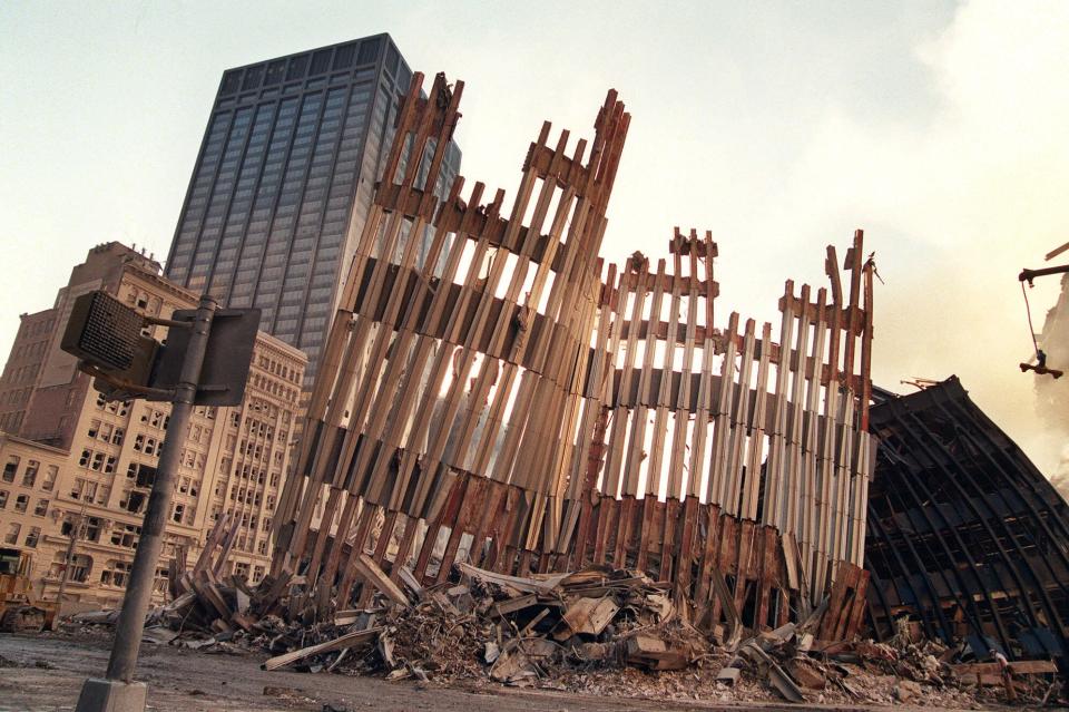 <p>Remains of the façade of 2 World Trade Center is all that stands after Tuesday’s terrorist attack, Wednesday, Sept. 12, 2001, in New York. (Photo: Nick Fanelli/AP) </p>