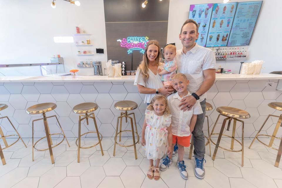 Shiver & Shake owners Andrew and Lisa Diaz stand in the lobby of the store with their children Adam, Makenna and Jordan on Friday, May 24, 2024.