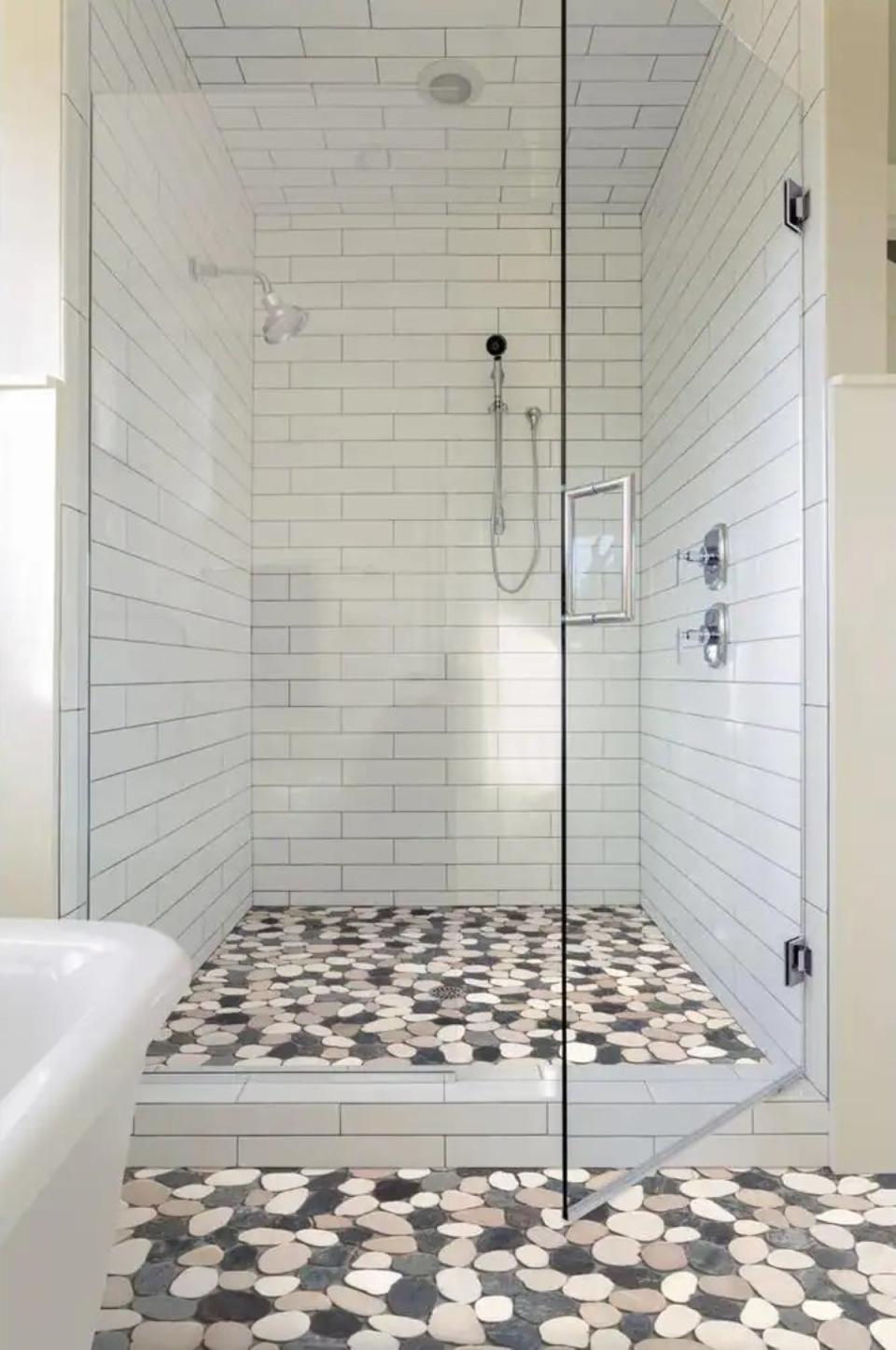 Subway tile shower ideas: Subway tile walls and stone floors