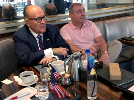 FILE PHOTO: U.S. President Trump's lawyer Rudy Giuliani has coffee with Russian born businessman Parnas at Trump Hotel in Washington