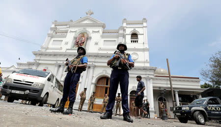 Sri Lankan military officials stand guard in front of the St. Anthony's Shrine, Kochchikade church after an explosion in Colombo, Sri Lanka April 21, 2019. REUTERS/Dinuka Liyanawatte