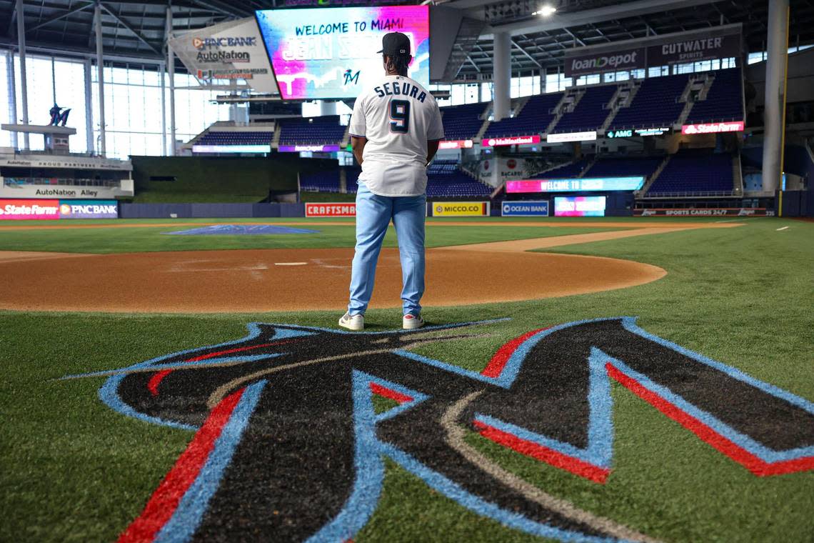 Jean Segura, new Miami Marlins infielder, poses at the top of the logo after being welcomed by the Miami Marlins on Wednesday, Jan. 11, 2023, at loanDepot Park.