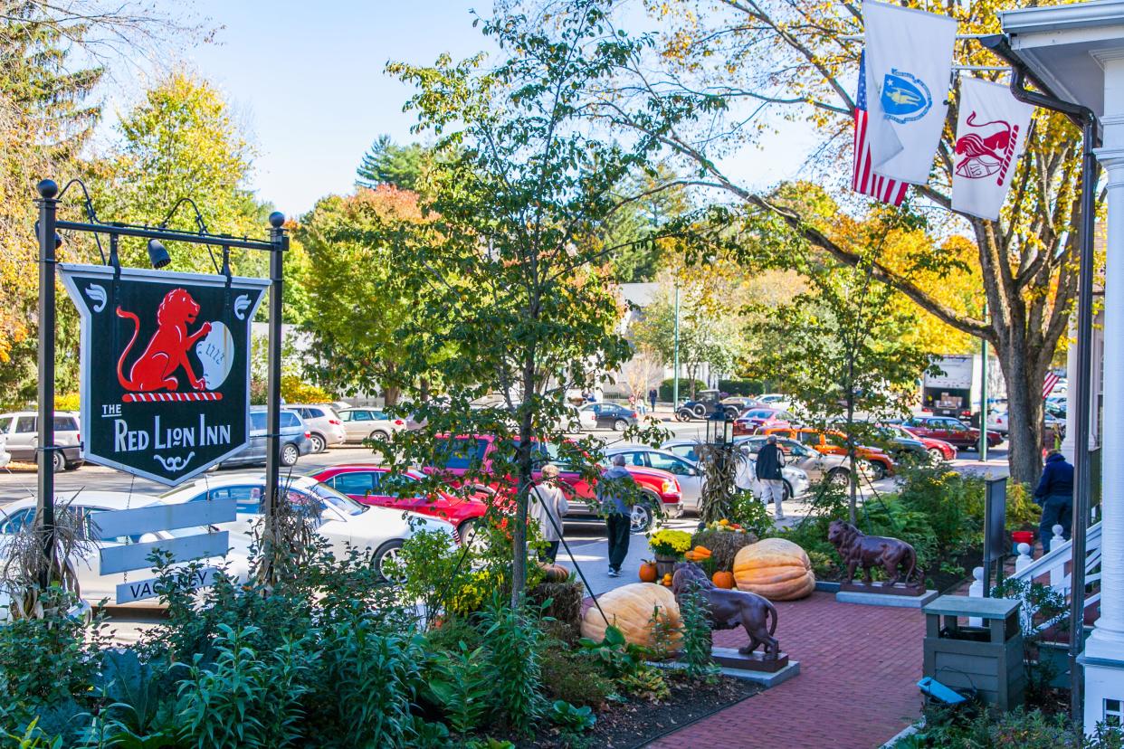 Stockbridge, Massachusetts, USA - October 13, 2010: Visitors enjoy the fall decorations of downtown Stockbridge in the fall of 2010.