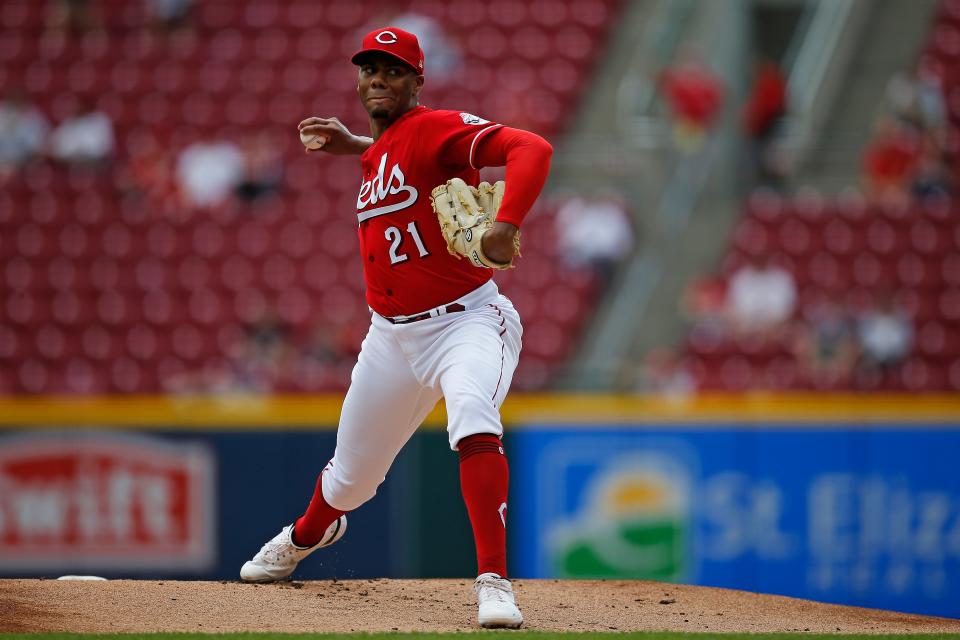 Cincinnati Reds starting pitcher Hunter Greene (21) throws a pitch in the first inning of the MLB National League game between the Cincinnati Reds and the Chicago Cubs at Great American Ball Park in downtown Cincinnati on Thursday, May 26, 2022. The Reds led 10-3 after three innings. 
