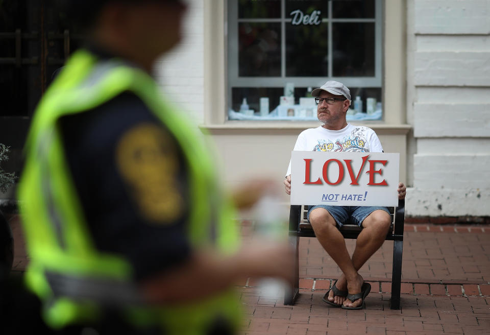 <p>Members of the Virginia State Police patrol the downtown mall area of the city Aug. 11, 2018 in Charlottesville, Va. (Photo: Win McNamee/Getty Images) </p>
