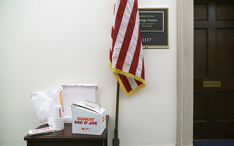 Coffee and doughnuts provided by Rep. George Santos (R-N.Y.) to journalists staking out his office in the Longworth House office building on Jan. 24. <em>Greg Nash</em>