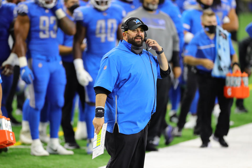 Matt Patricia stands on the sidelines. 