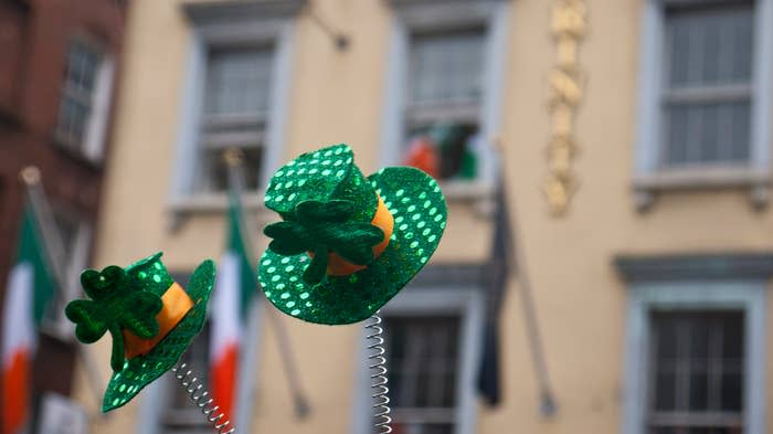 St. Patrick's Day decorations with shamrock motifs on display in a city setting, celebrating Irish culture