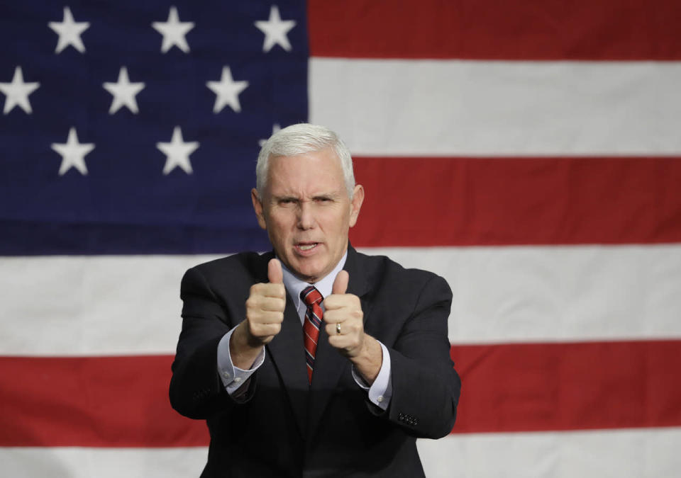 <p>Republican vice presidential candidate, Indiana Gov. Mike Pence reacts following a campaign rally, Sept. 30, 2016, in Fort Wayne, Ind. (Photo: Darron Cummings/AP)</p>