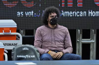 Cleveland Cavaliers' Anderson Varejao watches in the second half of an NBA basketball game against the Phoenix Suns, Tuesday, May 4, 2021, in Cleveland. Phoenix won 134-118 in overtime. (AP Photo/Tony Dejak)